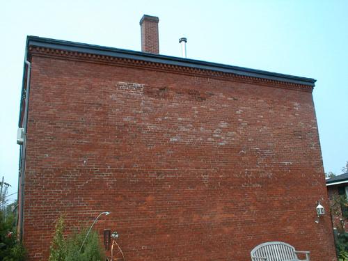 This image shows the rear façade of the building, 2007.; Province of New Brunswick
