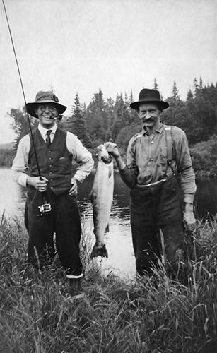 This image shows Dr. Clarke on the left, along with a guide, on a fishing excursion, circa 1920's-1930's.; G. F. Clarke Estate, restored by Mary Bernard