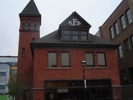 Of note is the façade with the embossed wood carving, “GFD”.; Kendra Green, 2007.