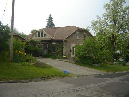 Of note is the rear elevation's fieldstone construction.; Kayla Jonas, 2007.