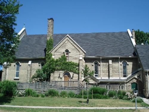Of note are the buttress, lancet windows with hood moulds and the central gable.; Kendra Green, 2007