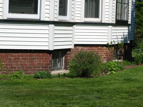 Brick-covered foundation; Town of Sussex