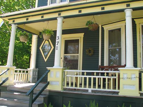 Diamond shaped window beside the entrance; Town of Sussex