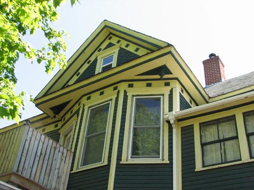Bay window capped with a gabled roof dormer; Town of Sussex