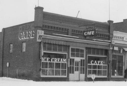 Archival view of the primary elevation of the Former Rex Cafe Site, the building that once occupied the present 125th Commemorative Park, Carberry, 1942.; Carberry Plains Archives, 1942