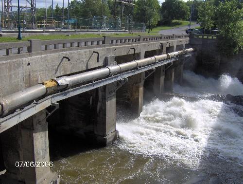 Photo of the dam, taken from under Boucher Bridge; Madawaska Historical Society