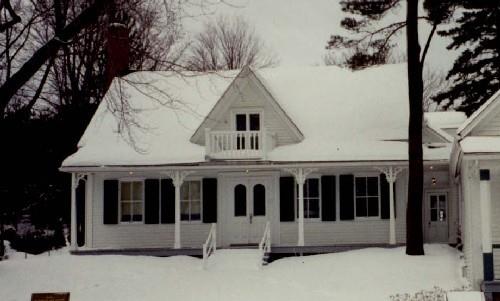 General view of the St. Laurent House, showing the long gallery across the façade, 1993.; Parks Canada Agency / Agence Parcs Canada, 1993.
