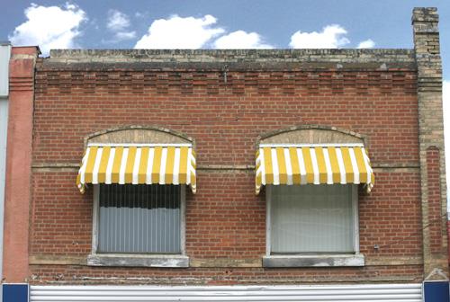 Detail view of the wall and roofline of the Kowalchuk Building, Carberry, 2008; Historic Resources Branch, Manitoba Culture, Heritage and Tourism, 2008