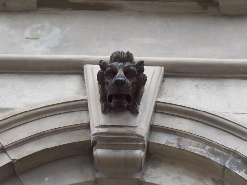 One of three lion heads located in the keystones of the arched windows on the main facade, 214 Duckworth Street. Photo taken June 13, 2007.; Deborah O'Rielly HFNL 2007