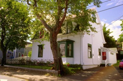 East view of 7 Monkstown Road, showing main facade and north side. Photo taken 1990s.; HFNL 2007