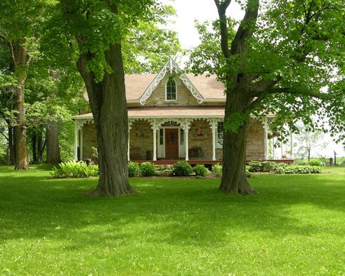 Front elevation through mature trees at McKinley House – 2006; OHT, 2006