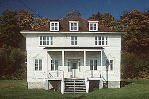 General view of Building 49, showing the regularly spaced windows of the façade, circa 2004.; Parks Canada Agency / Agence Parcs Canada, circa/vers 2004.