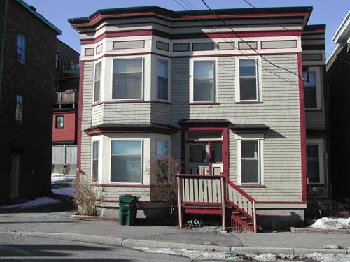 This photograph illustrates the front façade with the recession on the eastern end of the facade, 2005; City of Saint John