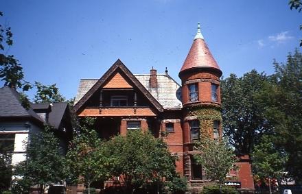 View of the front façade on St. George Street showing tower and third floor verandah – 1999; OHT, 1999