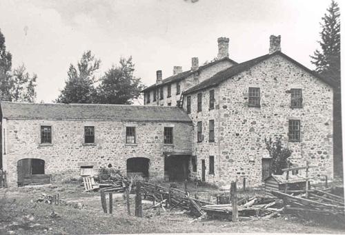 View of the south side showing rear gymnasium addition and covered carriage way – c. 1900; Unknown – c. 1900