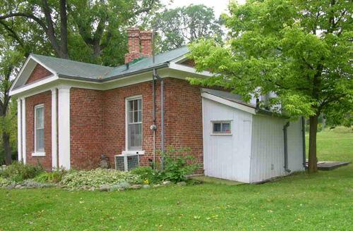 Oblique view of the rear showing lean-to addition – 2004; OHT, 2004