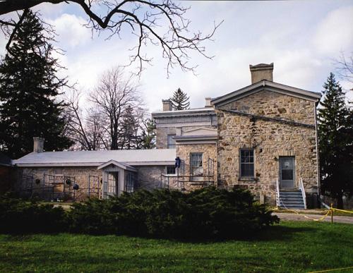 Rear elevation showing kitchen and drill hall wings –  2000; OHT, 2000