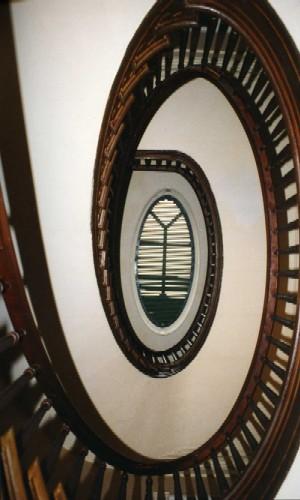 Staircase showing the curve from main floor hallway  up to the oval skylight– 2000; OHT, 2000