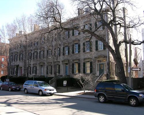 Front façade looking east showing details of the main façade, maturing trees and some context – 2006; OHT, 2006