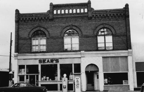 Archival view, from the east, of the Charlie Sear Building, Carberry, ca. 1965; Carberry Plains Archives, ca. 1965