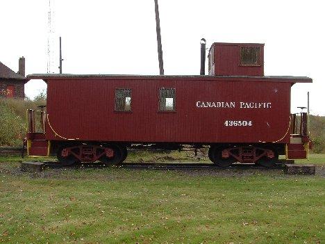 Wooden clad CPR caboose; McAdam Historical Restoration Committee