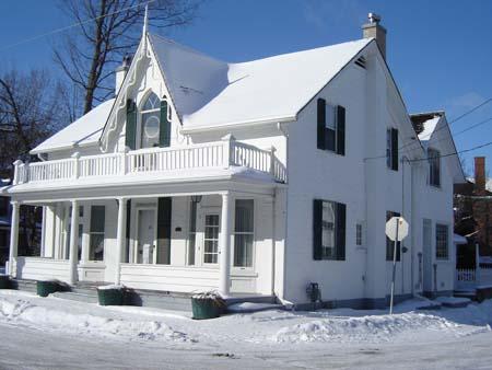 This image captures the symmetry of the windows on this Gothic House, 2007.; Lindsay Benjamin, 2007.