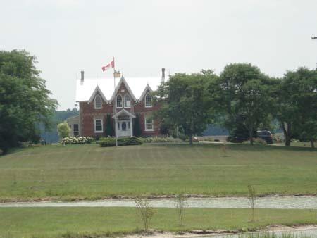 Of note are the three gables and gothic windows.; Kendra Green, 2007.