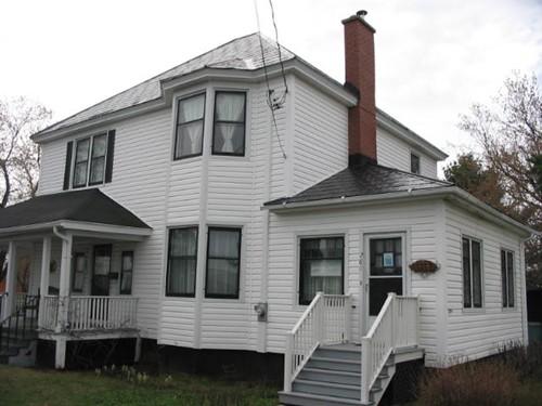 The west side of the front façade of the house; City of Bathurst