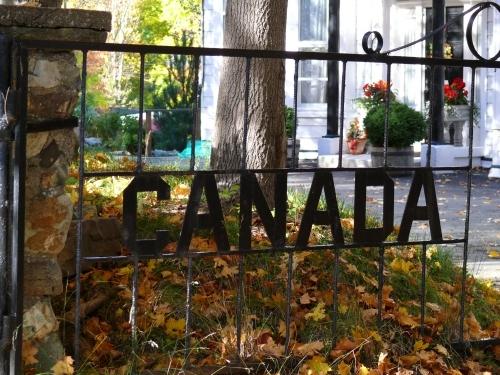 One half of the iron gate that opens onto the property 74 Circular Road, Canada House.  Entire gate says "Canada House" when closed. Photo taken October 26, 2007.; Deborah O'Rielly/ HFNL 2007