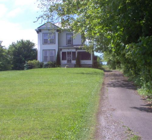 Close-up image of the house; Town of St. George
