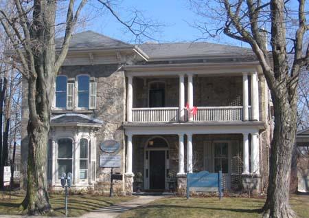 Of note are two-storey porch and transom above entrance.; Lindsay Benjamin, 2007.