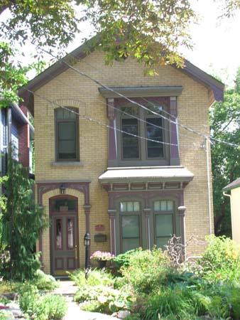 Of note is the first-storey bay window surmounted by an ornate cornice.; Lyndsay Haggerty, 2007.