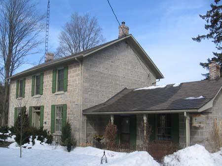View of the south façade depicting the rubble limestone walls, 2007.; Lindsay Benjamin, 2007.