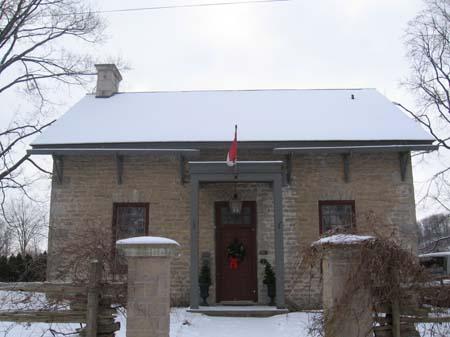 View of the north façade depicting the single door with transom, 2007.; Lindsay Benjamin, 2007.