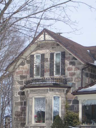 Detailed view of the front triple bay window, decorative brackets and ornamental cresting, 2007.; Lindsay Benjamin, 2007.