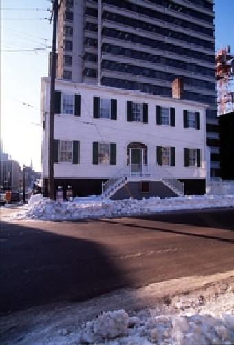 View of the Loyalist House, showing its evenly spaced sash windows, 1993.; Parks Canada Agency / Agence Parcs Canada, 1993.