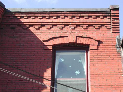 This photograph shows the brick design at the roofline, 2005; City of Saint John