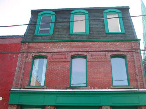 This photograph shows the roof and second storey of the building, 2005; City of Saint John