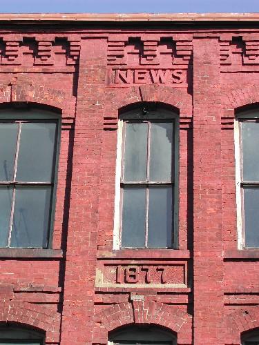 This photograph shows the corbel bands at the roof-line and the detail of the front façade, 2005; City of Saint John