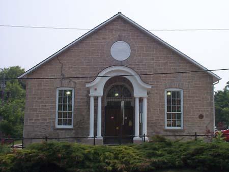 West facing façade featuring fan light over the central entranceway, circa 2004.; Township of Centre Wellington