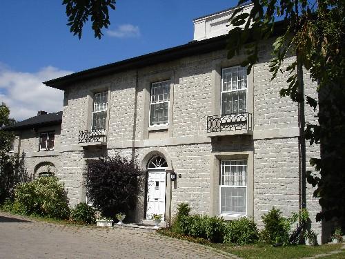 Oblique view of St. Andrew's Manse showing main house and wing; RHI 2006