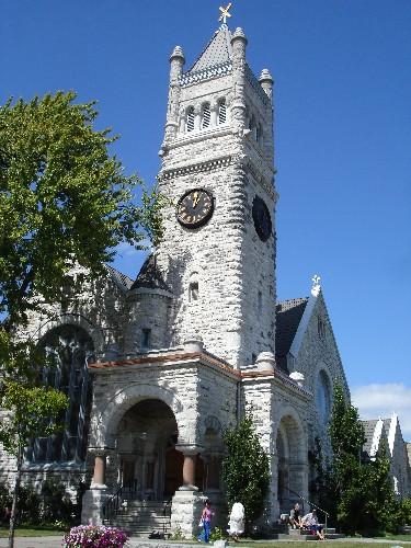 Clock tower of St. Andrew's Presbyterian Church, at the corner of Princess and Clergy Streets.; RHI 2006