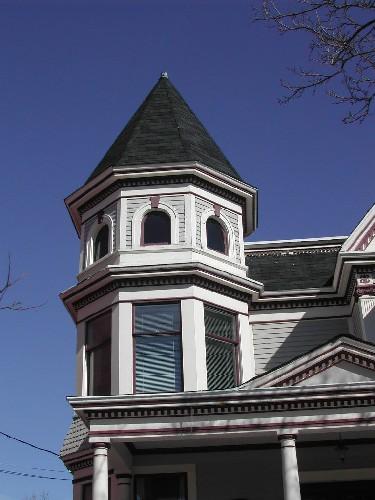 This photograph shows the north tower with its Roman arch windows and conical roof, 2005; City of Saint John