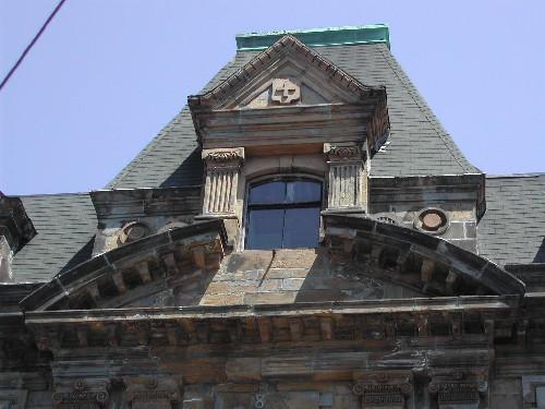 This photograph shows the pavilion roof and the arched pediment, 2005; City of Saint John