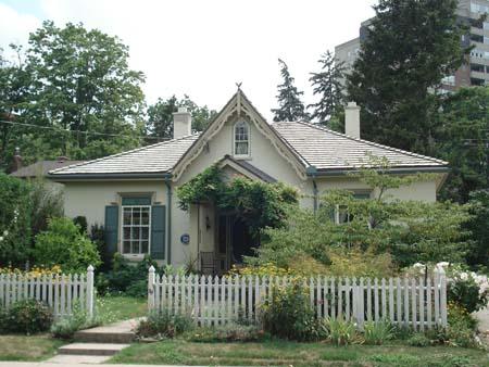 Of note is the stucco over double-brick construction and symmetrical composition.; Martina Braunstein, 2007.