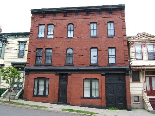 This photograph shows the contextual view of the building, 2005; City of Saint John