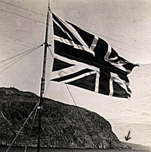 View of the Old Lighthouse Site, indicated by an arrow in the background of the photo. The flag in the foreground is the John Guy Flag Site. Photo taken circa 1935.; Deborah O'Rielly/ HFNL 2008