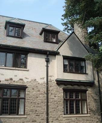 Of note are the stone and stucco construction and tall, narrow, multi-paned windows.; Martina Braunstein, 2007.