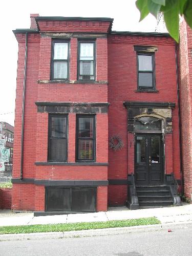 This photograph shows the full front façade of the residence, 2005; City of Saint John