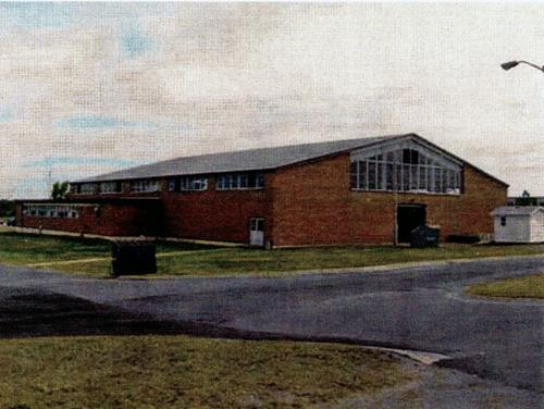 North-east elevation of the Drill Hall, showing its simple and unadorned exterior composition, 2001.; Department of National Defence / Ministère de la Défense nationale, 2001.